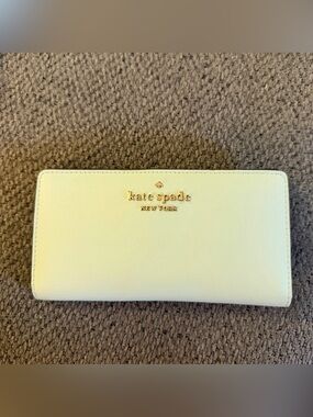 kate spade mint green bifold wallet with gold logo